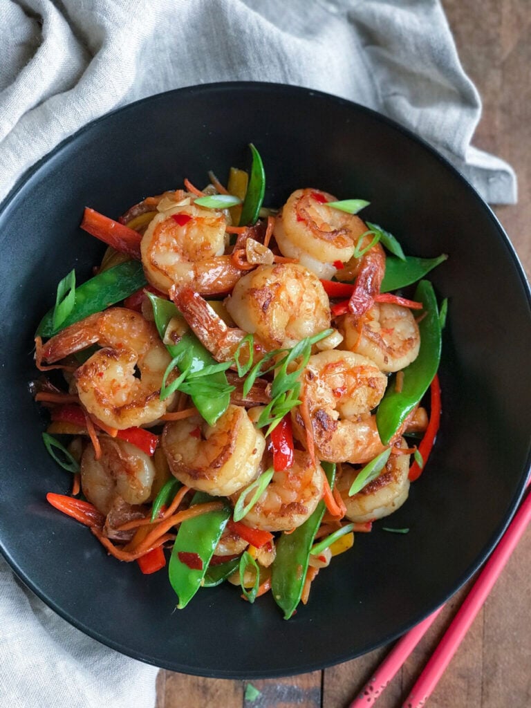 Sweet and Chili Shrimp Stir fry Sweet and Spicy Shrimp in a wok