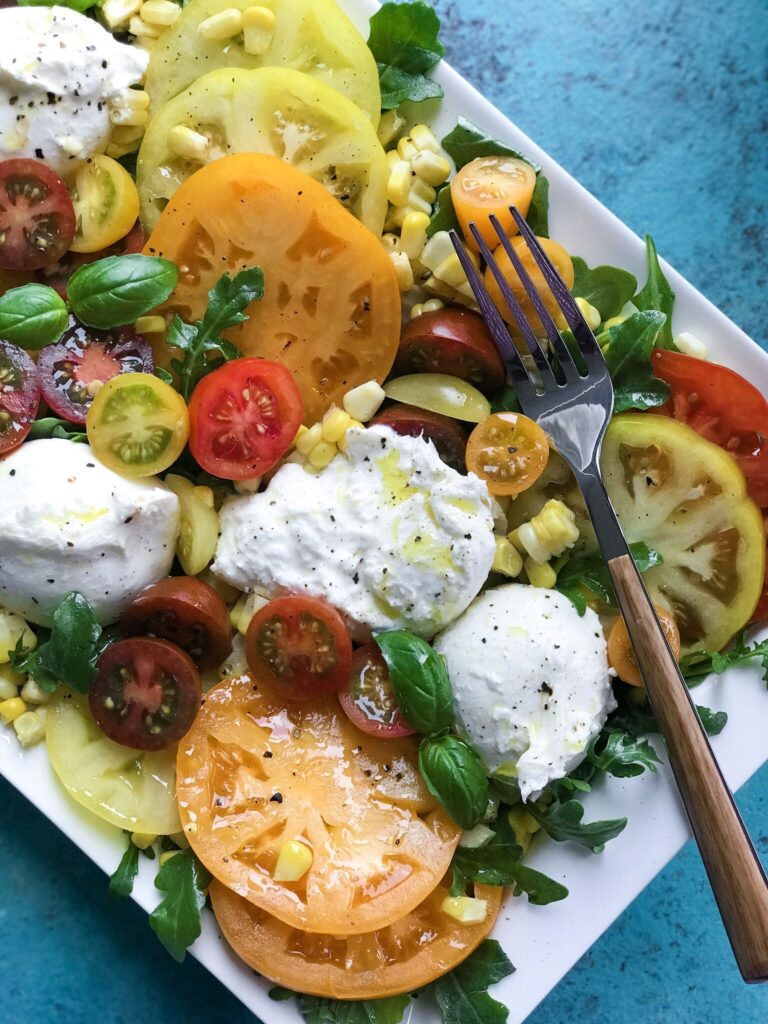 Tomato and Burrata Salad on a plate