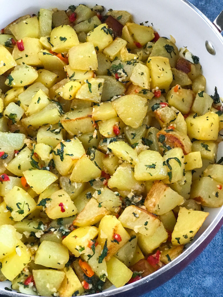 Lebanese Spicy Potatoes in a skillet ready to serve