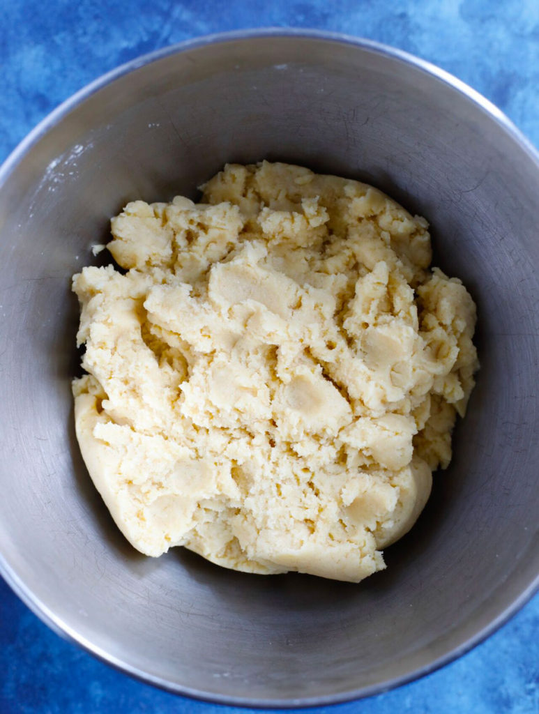 The dough in a mixing bowl