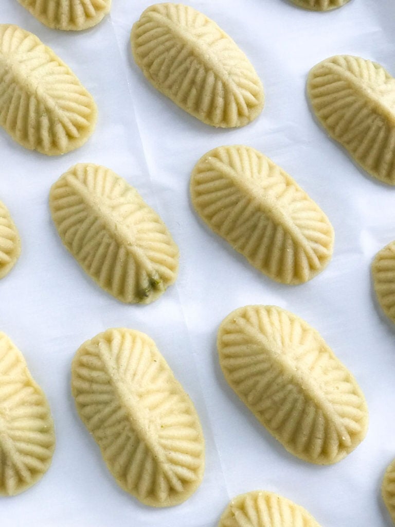 Unbaked Maamoul Cookies on parchment paper