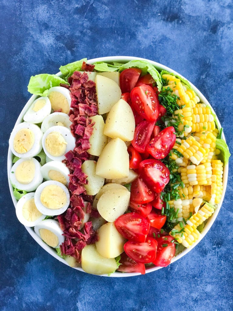 Potato Cobb Salad in a bowl without dressing