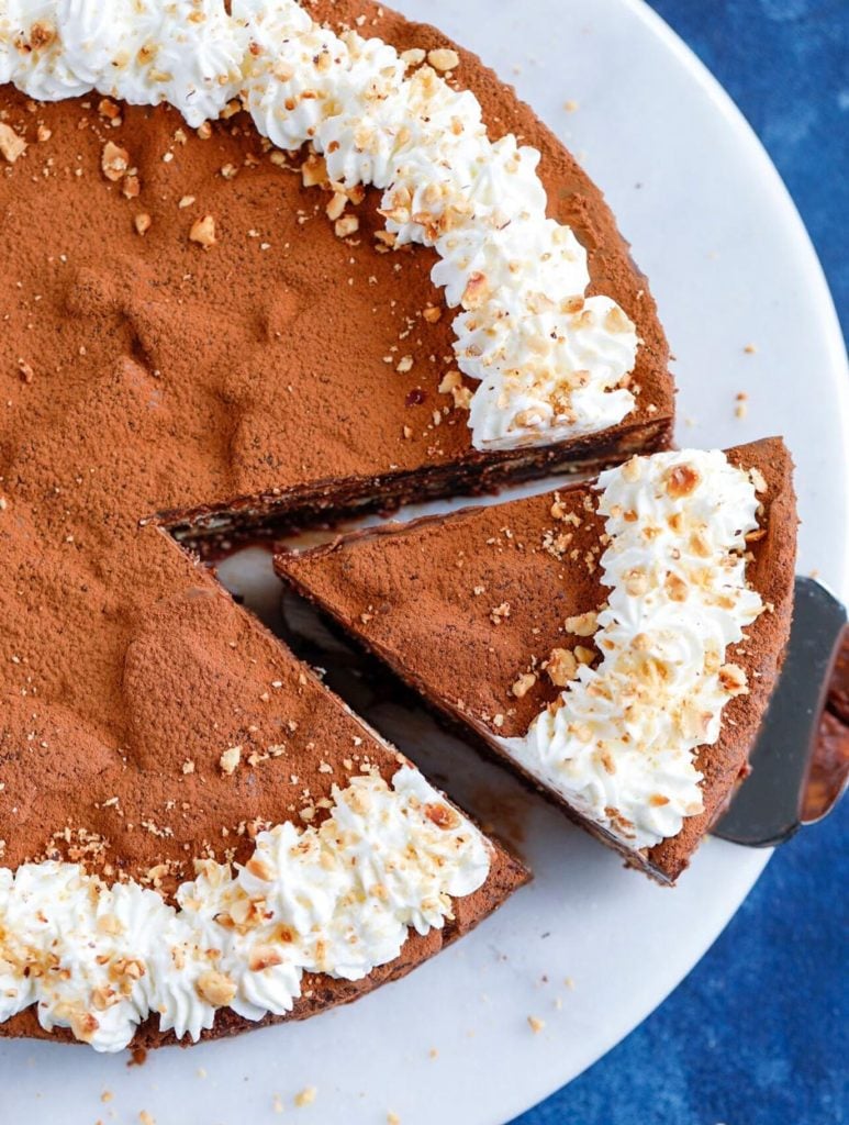 A slice being served from the no-bake chocolate cake