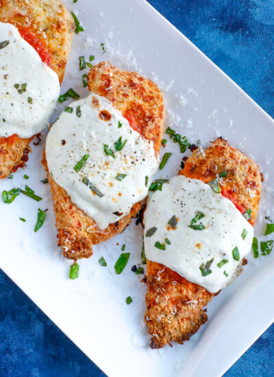 Baked parmesan chicken with marinara sauce and cheese