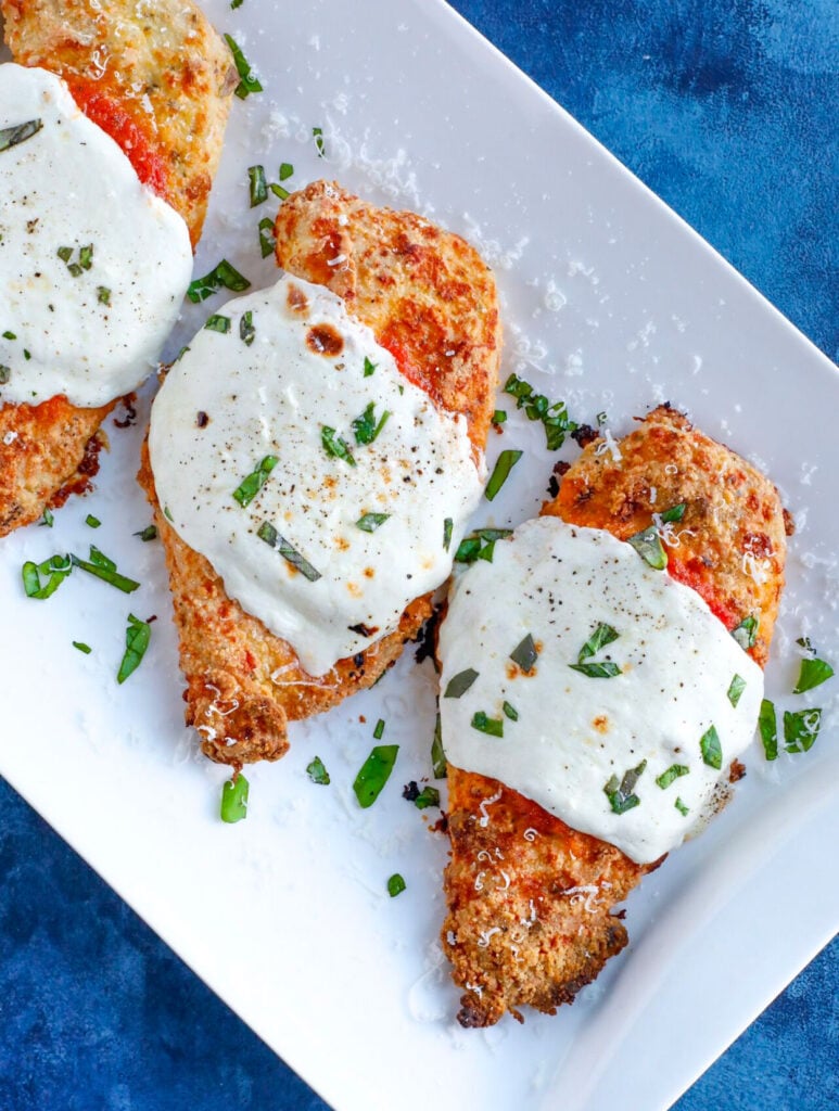 Baked parm chicken with marinara sauce and cheese 