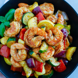 Shrimp and Vegetable served on a black plate