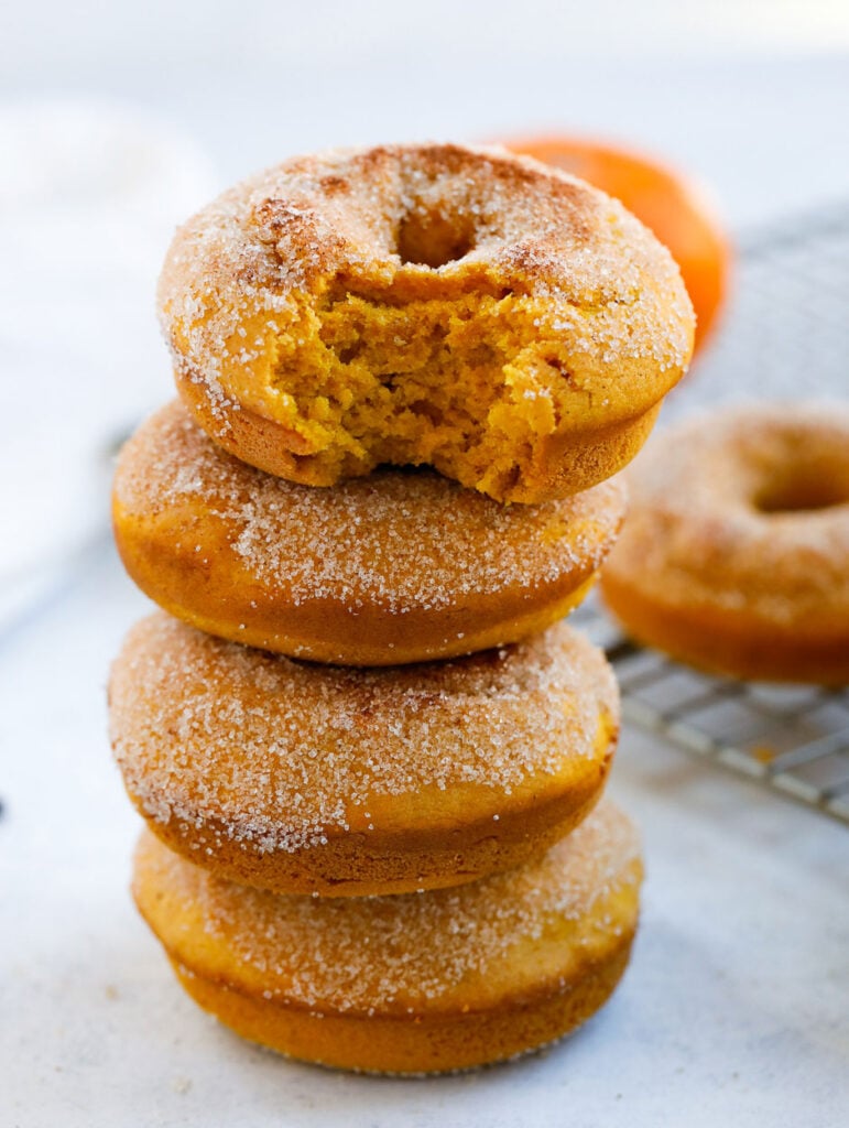 stack of baked pumpkin donuts