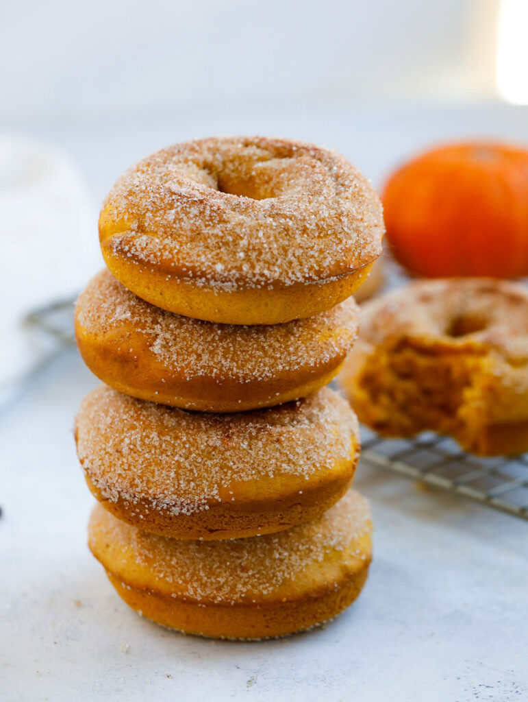 baked pumpkin donuts baked donuts on a table