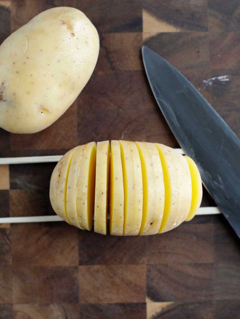 potatoes cut into hassleback form