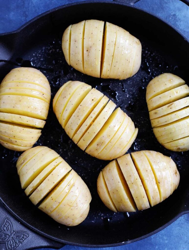 hassleback potatoes in a skillet