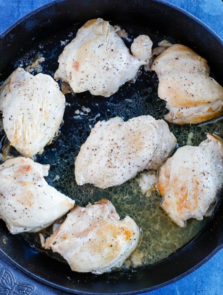 Pan seared chicken in a skillet