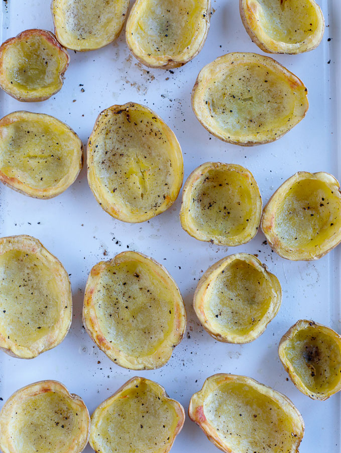 baked potato skins on a baking tray