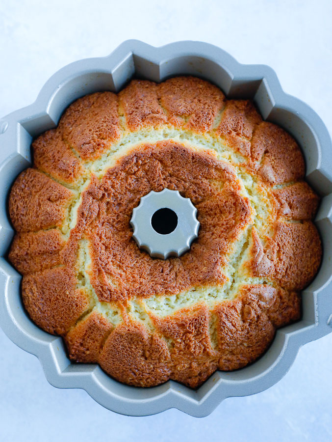 Top down view of bundt cake in a pan.