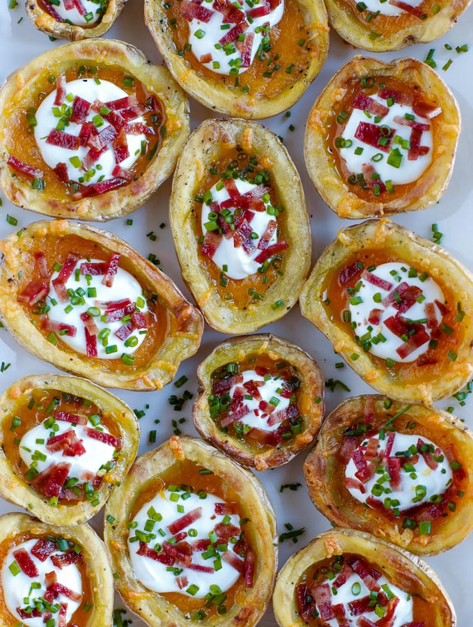 cripsy baked potato skins overhead shot of Baked Potato Skins with toppings