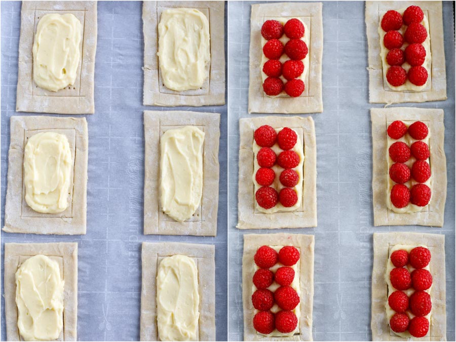 Baking sheet covered with puff pastry rectangles with custard on them on the left and topped with raspberry on the right.