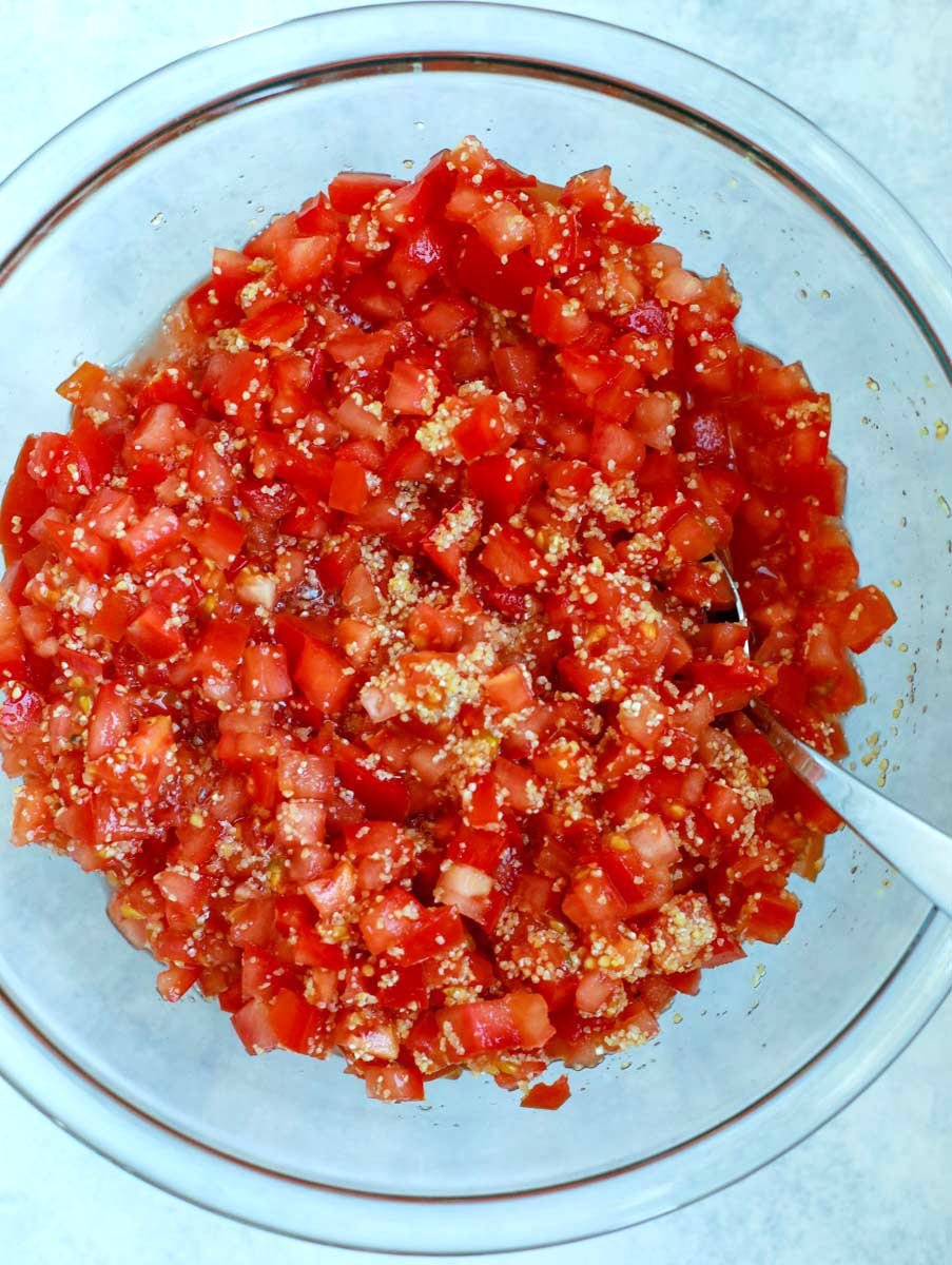 Diced tomatoes and bulgur in a bowl
