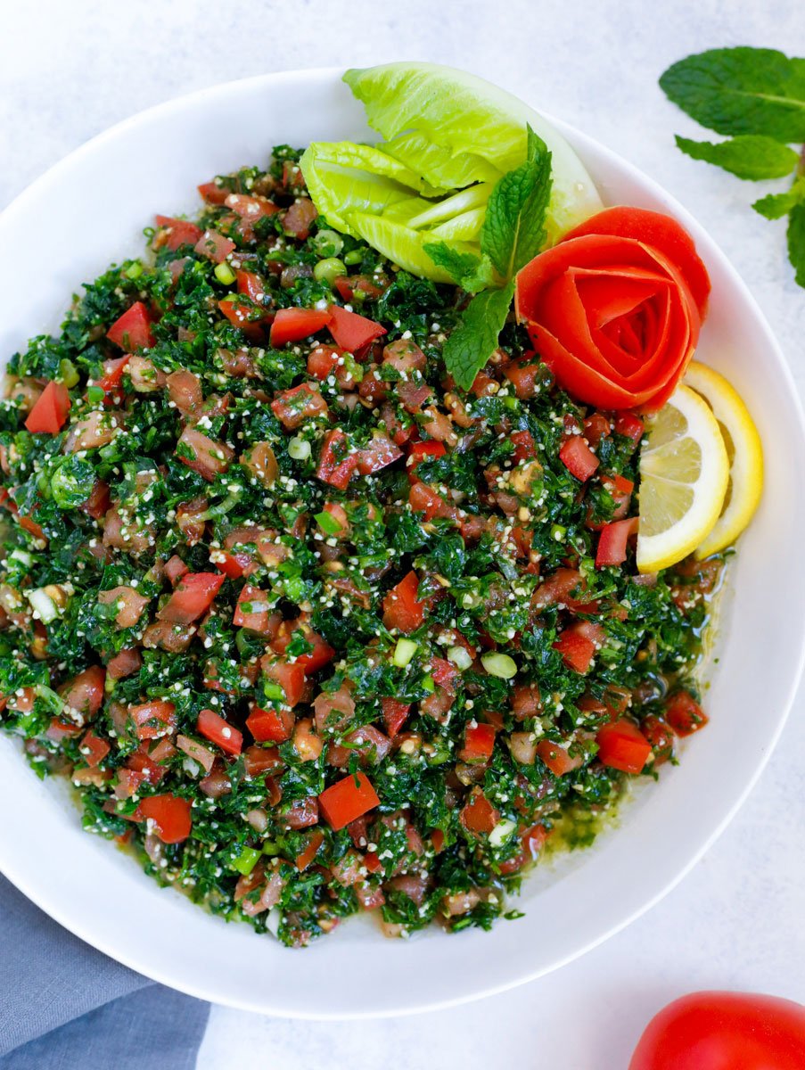 Lebanese tabbouleh salad served in a large white bowl