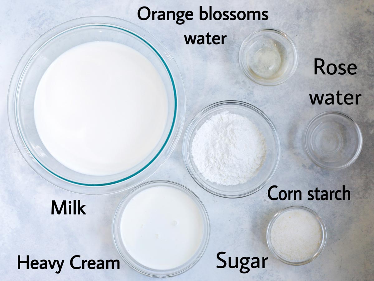 atayef filling mixture ingredients laid out. milk, cream, sugar, corn starch, rose water, orange blossoms water 