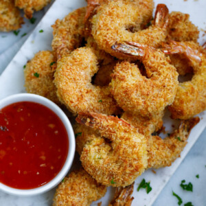 Baked coconut shrimp served with a red sauce