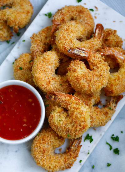 Baked coconut shrimp served with a red sauce