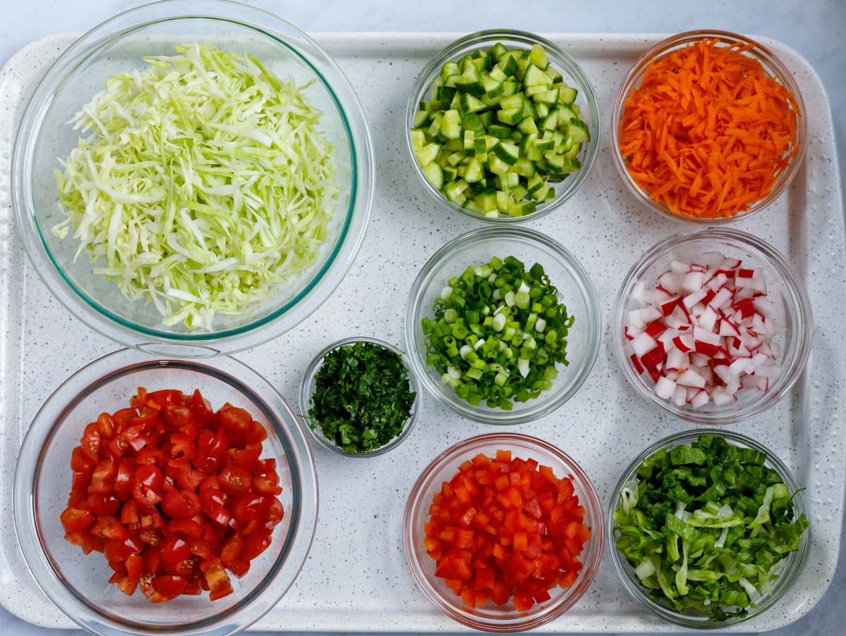 Ingredinets for the salad in glass bowls