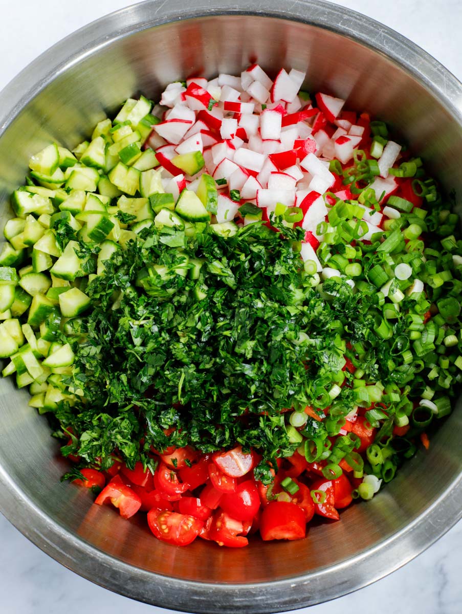 The chopped vegetables in a large bowl
