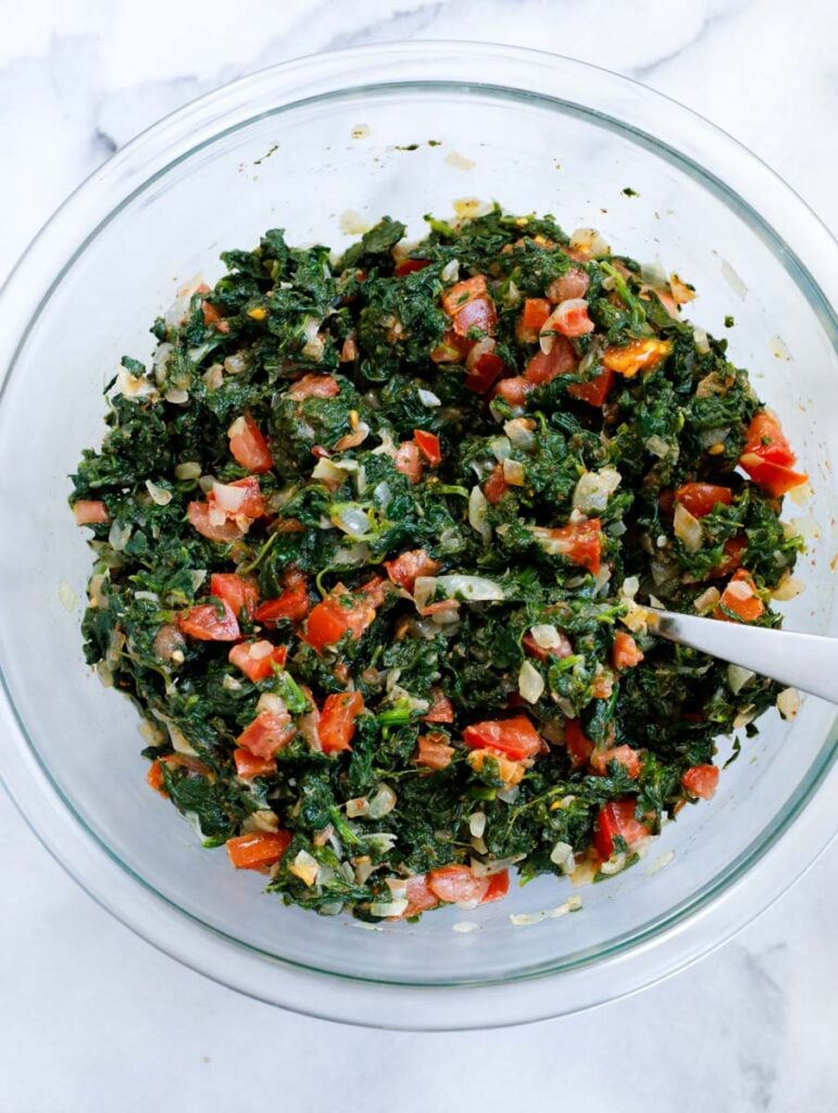 finished spinach pie filling in a bowl