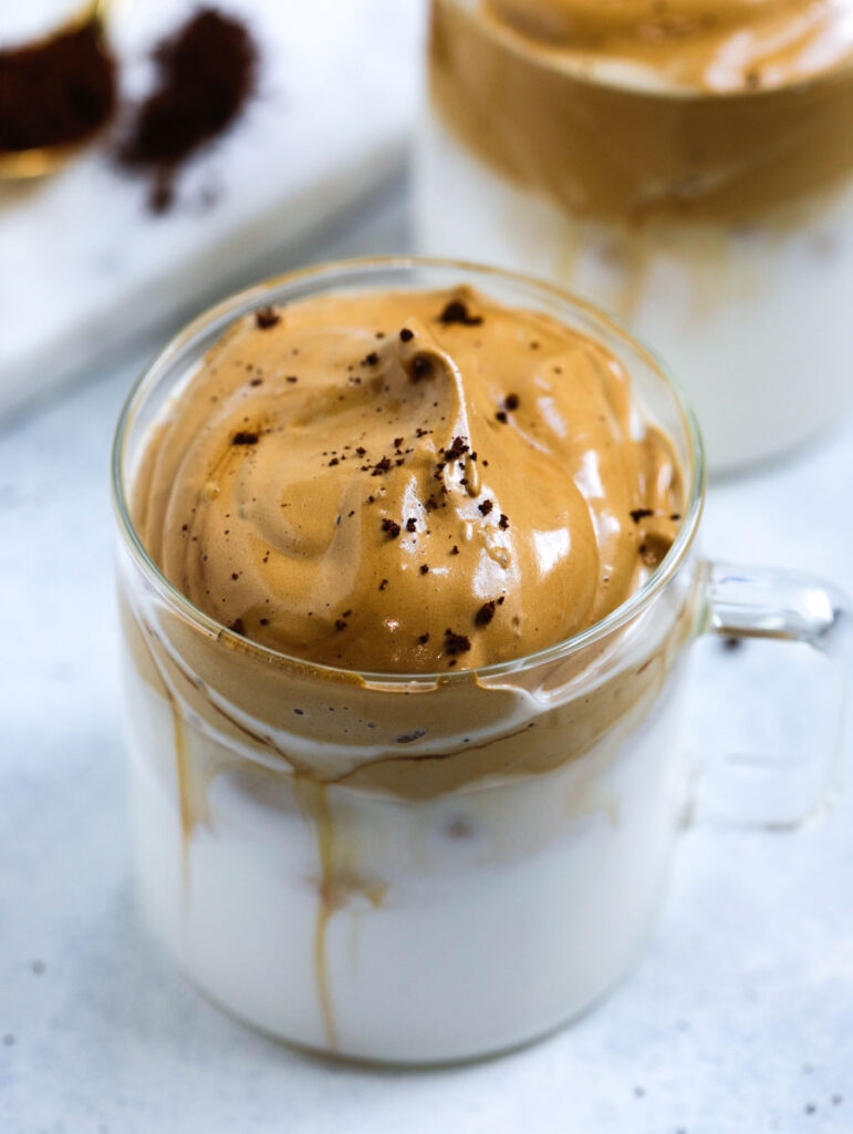 whipped coffee in a cup garnish with instant coffee