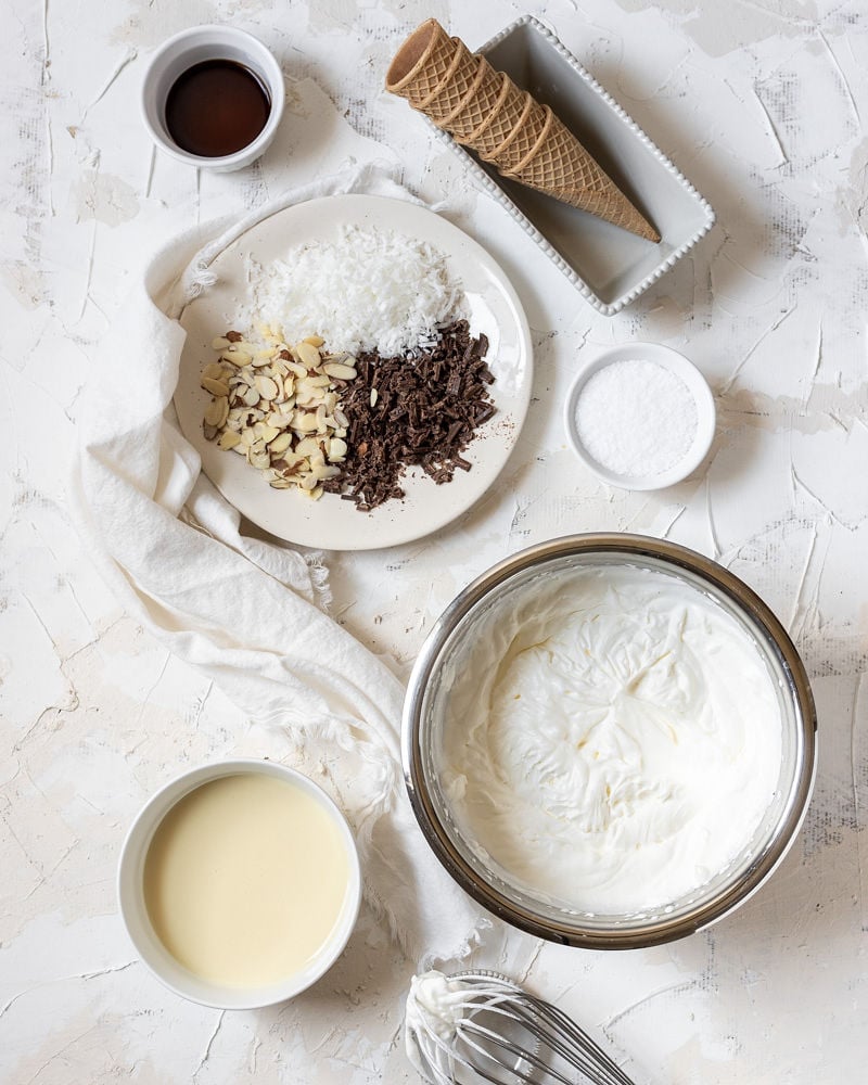 ingredients of the almond joy ice cream laid on a table