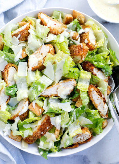 chicken caesar salad served in a dish