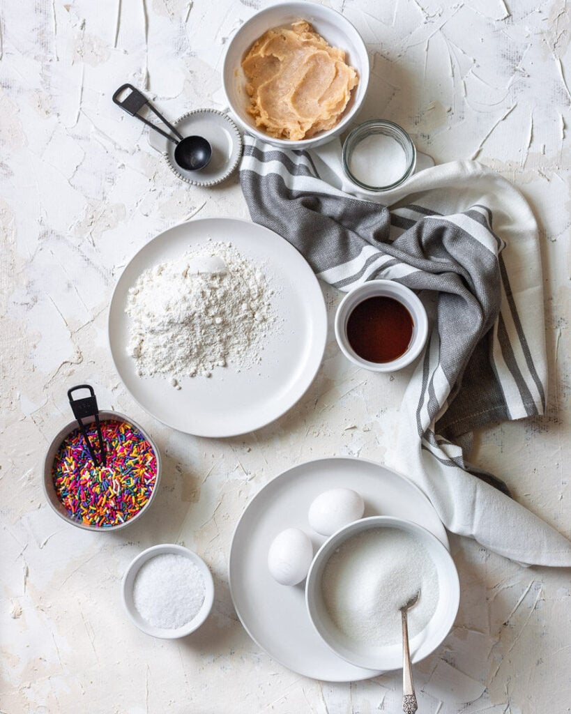 Ingredients of the cookies styled in plates and bowls