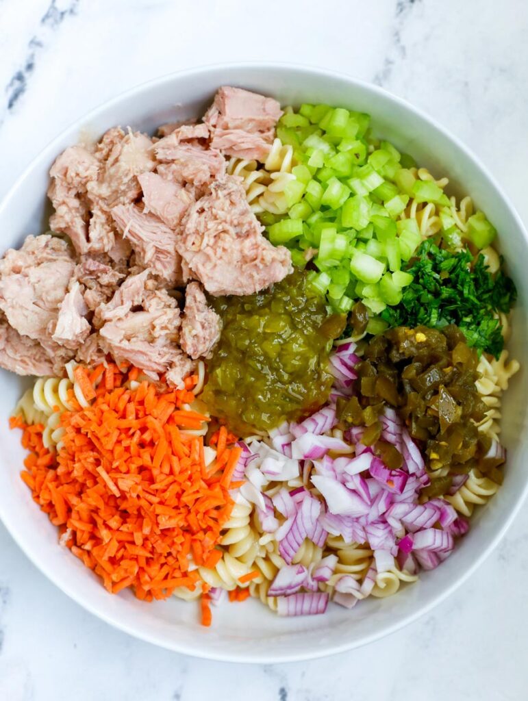 Tuna Pasta Salad ingredients in a white bowl