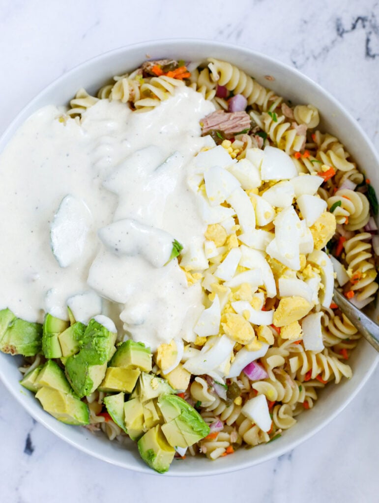 dressing on top of pasta salad