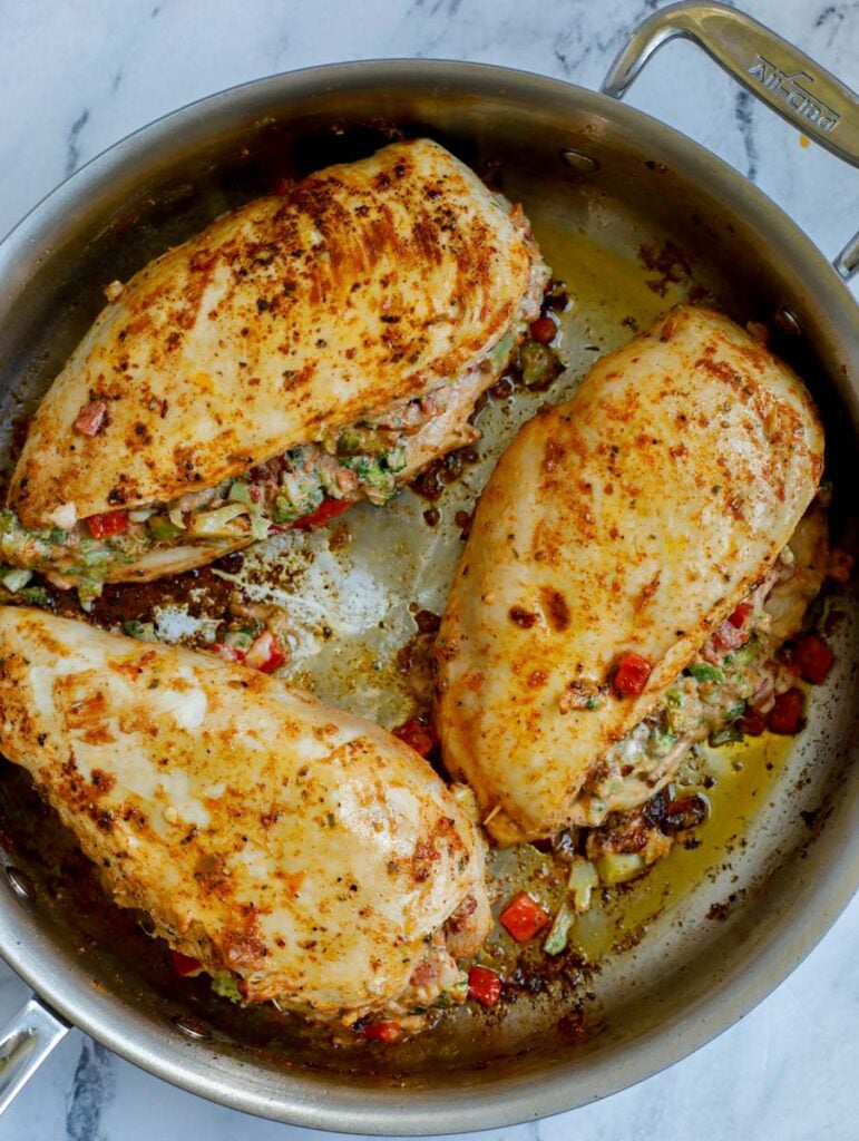 Broccoli and Cheese Stuffed Chicken in a skillet