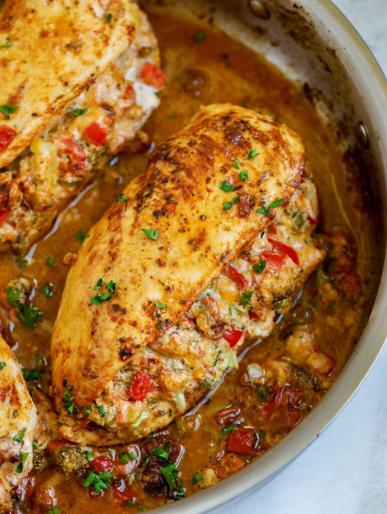 stuffed chicken breast in a skillet