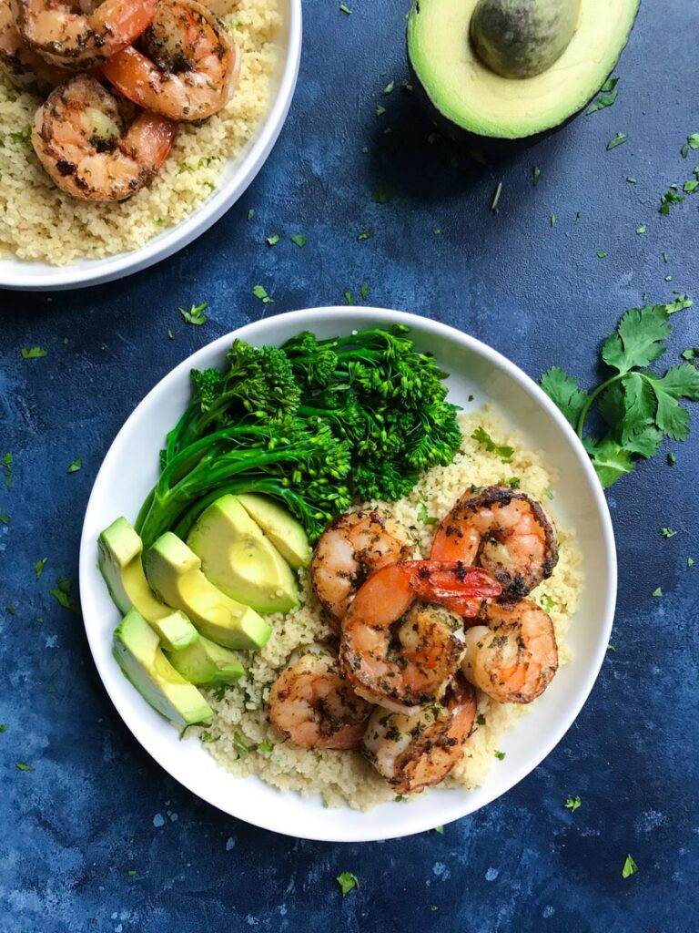 cilantro lime shrimp served with broccolini and avocado