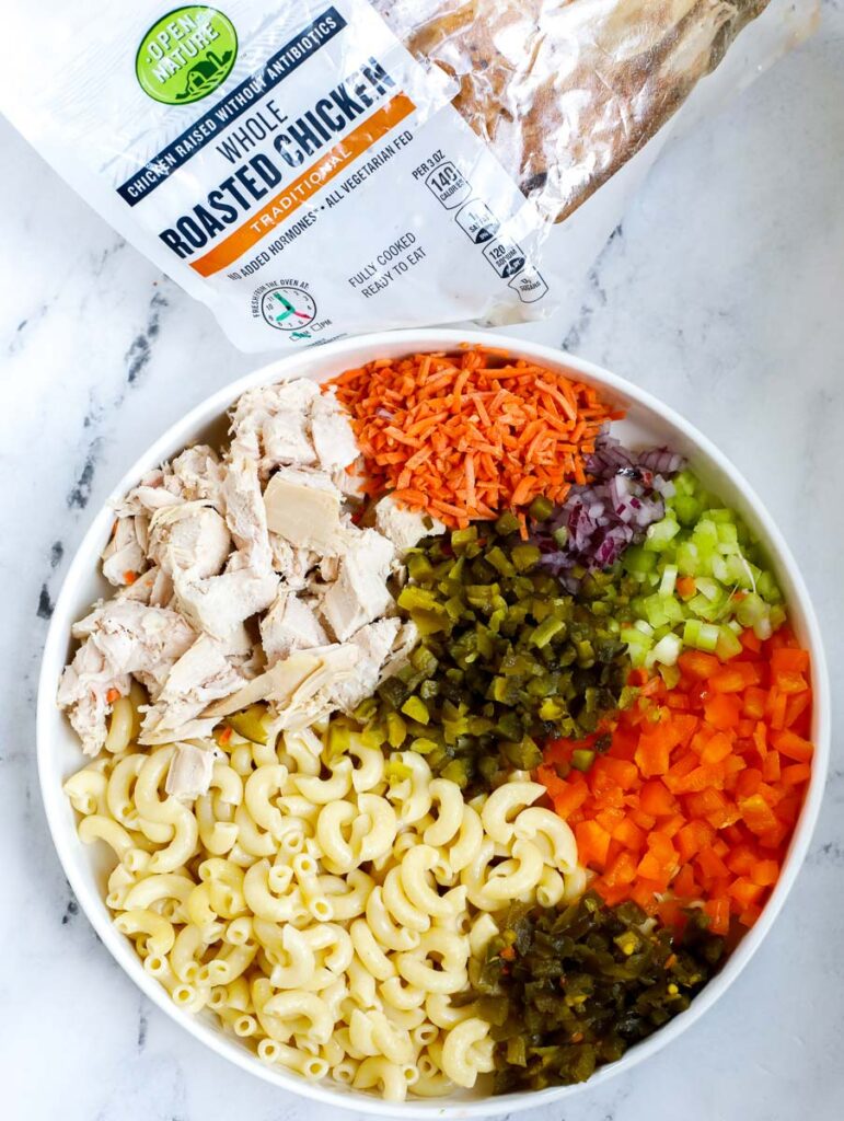 macaroni salad ingredients in a bowl