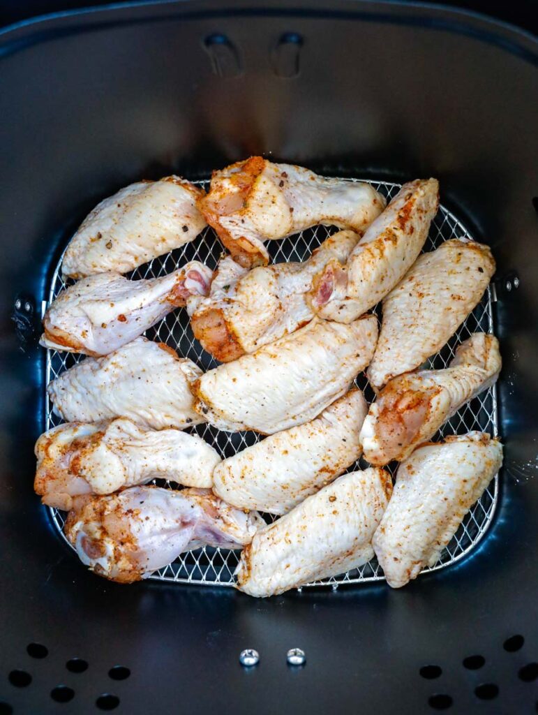Air Fryer Chicken Wings in air fryer basket.