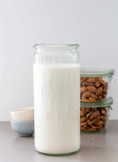 almost milk in a jar with whole almonds in the background