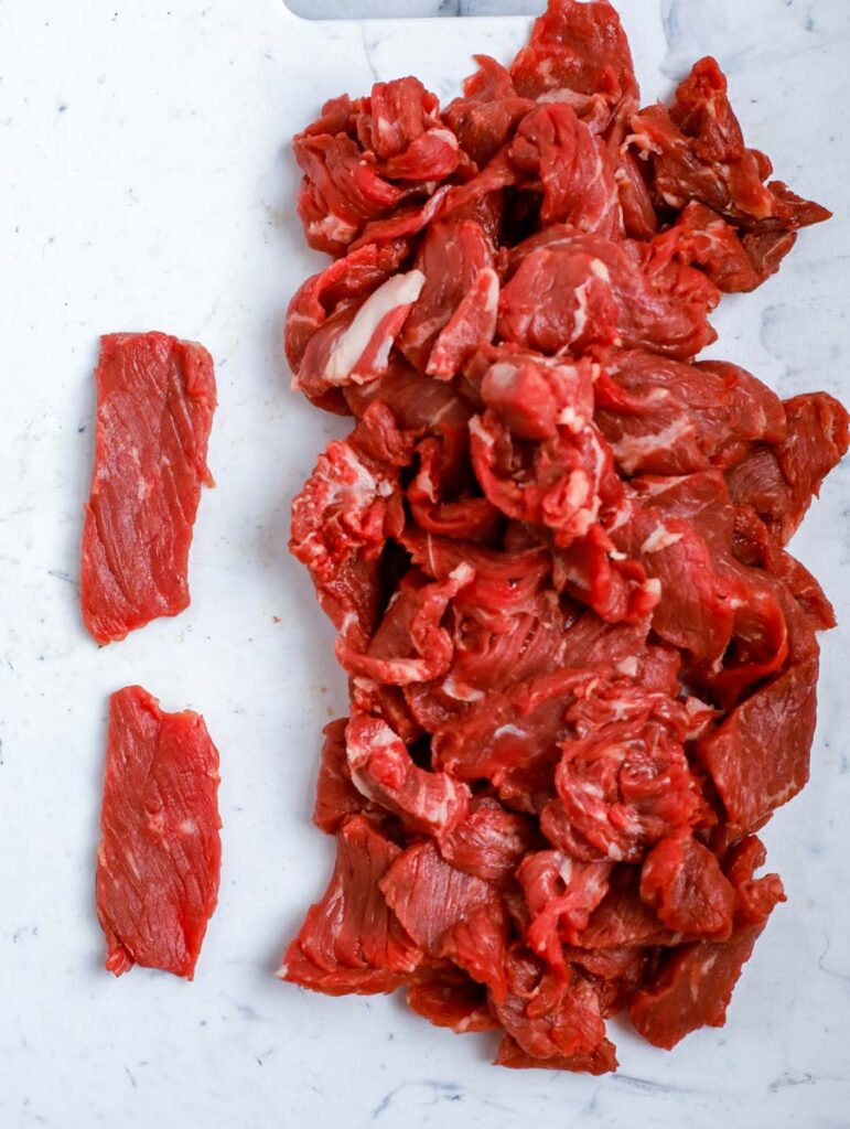 sliced beef on a counter top