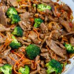 overhead shot of Beef and Broccoli Stir Fry in a white bowl