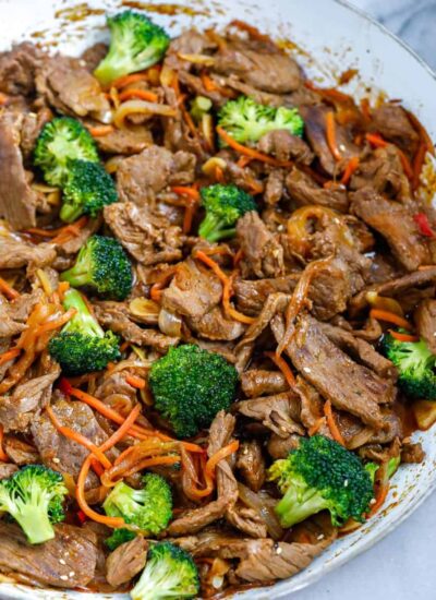 overhead shot of Beef and Broccoli Stir Fry in a white bowl