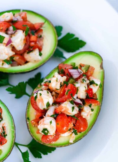 Shrimp Stuffed Avocado on a white plate.