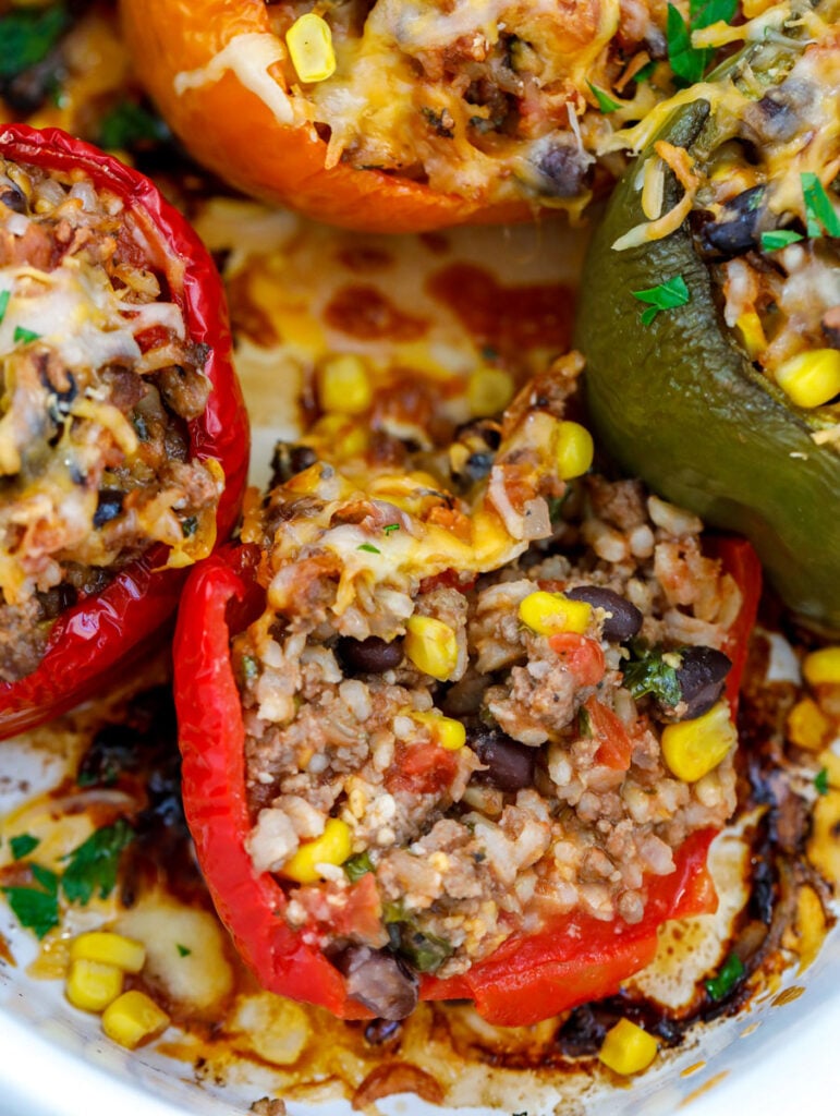 close up of Healthy Stuffed Peppers in a dish.