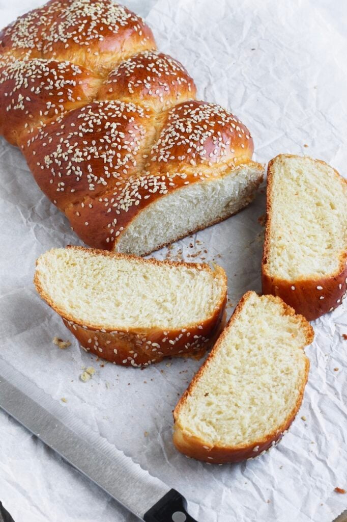 Angled image of the inside of a loaf of challah bread.