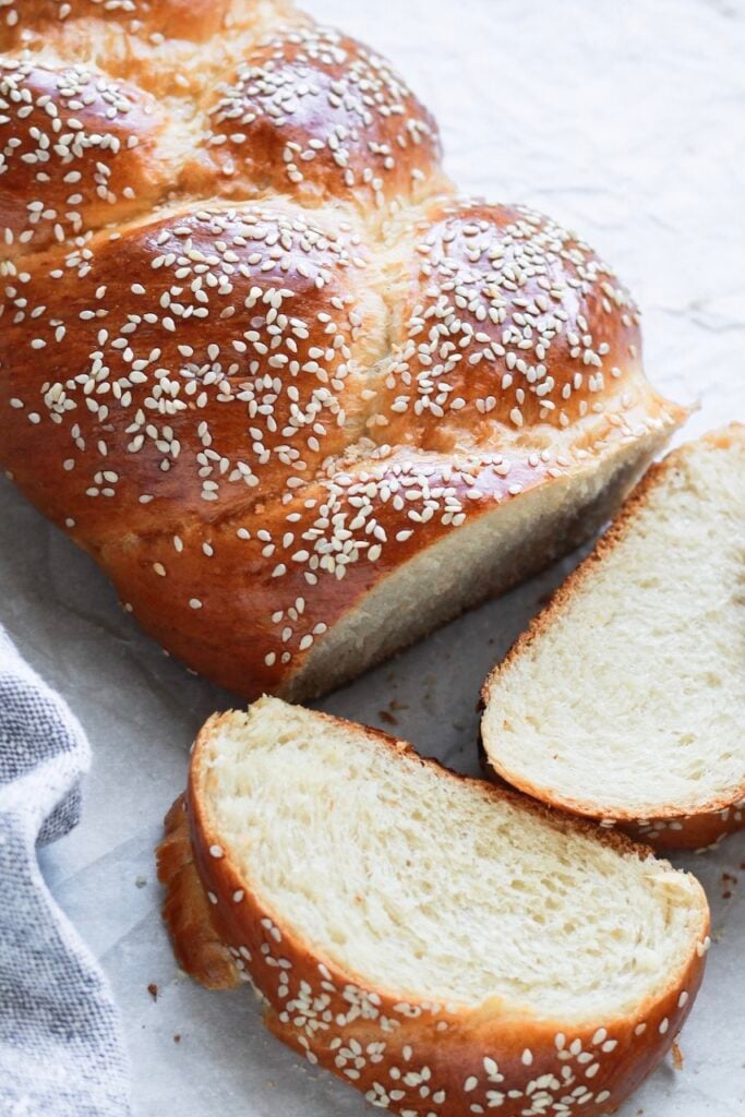 Challah bread sliced opened.