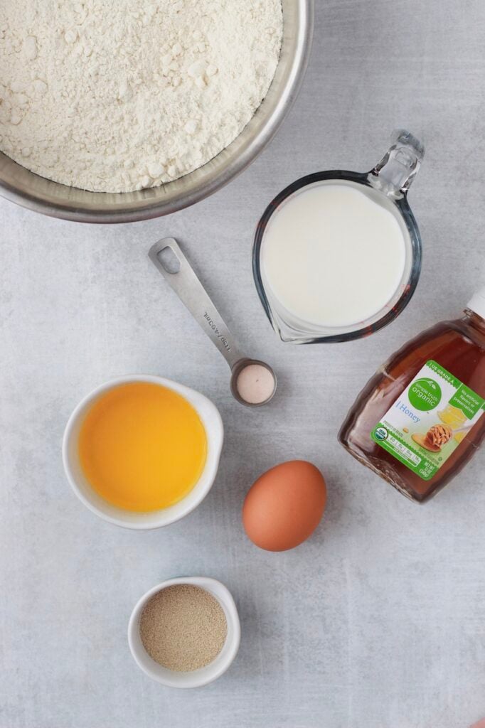 Overhead image of ingredients required to make sandwich bread.