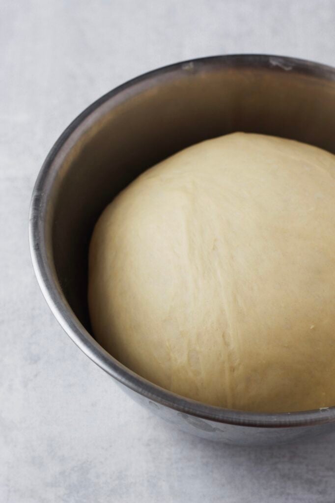 Dough proofing in a bowl.