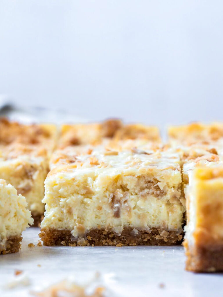 side shot of the cheesecake bars showing the inside