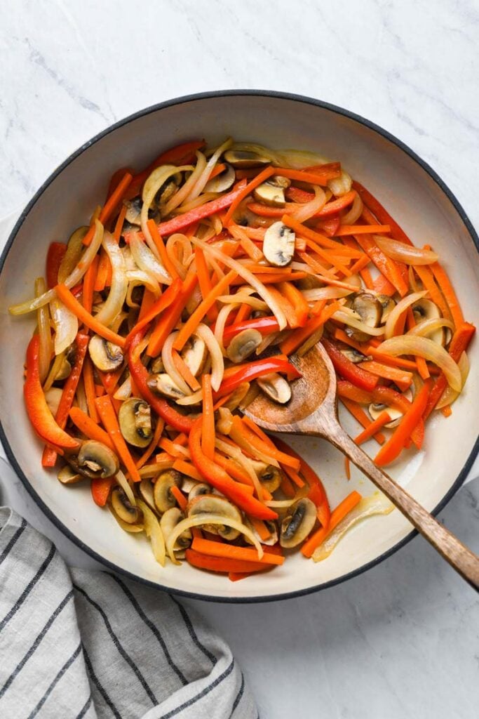 veggies sautéed in a skillet